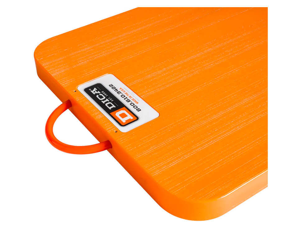 Orange Outrigger Pads to help with load distribution and ground protection