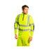 Person wearing a bright yellow high-visibility jacket and pants on a white background