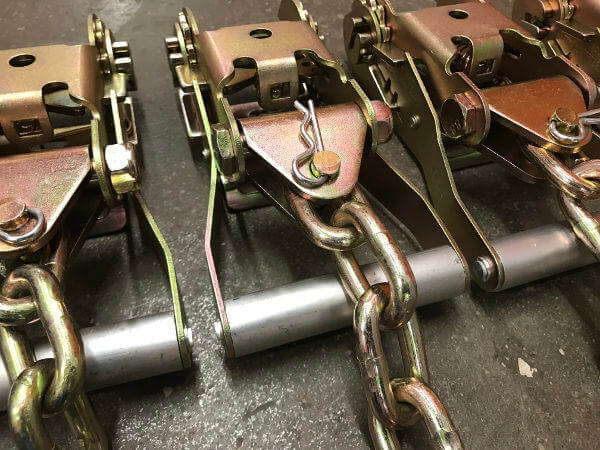 Standard wide ratchet buckles with chain extension